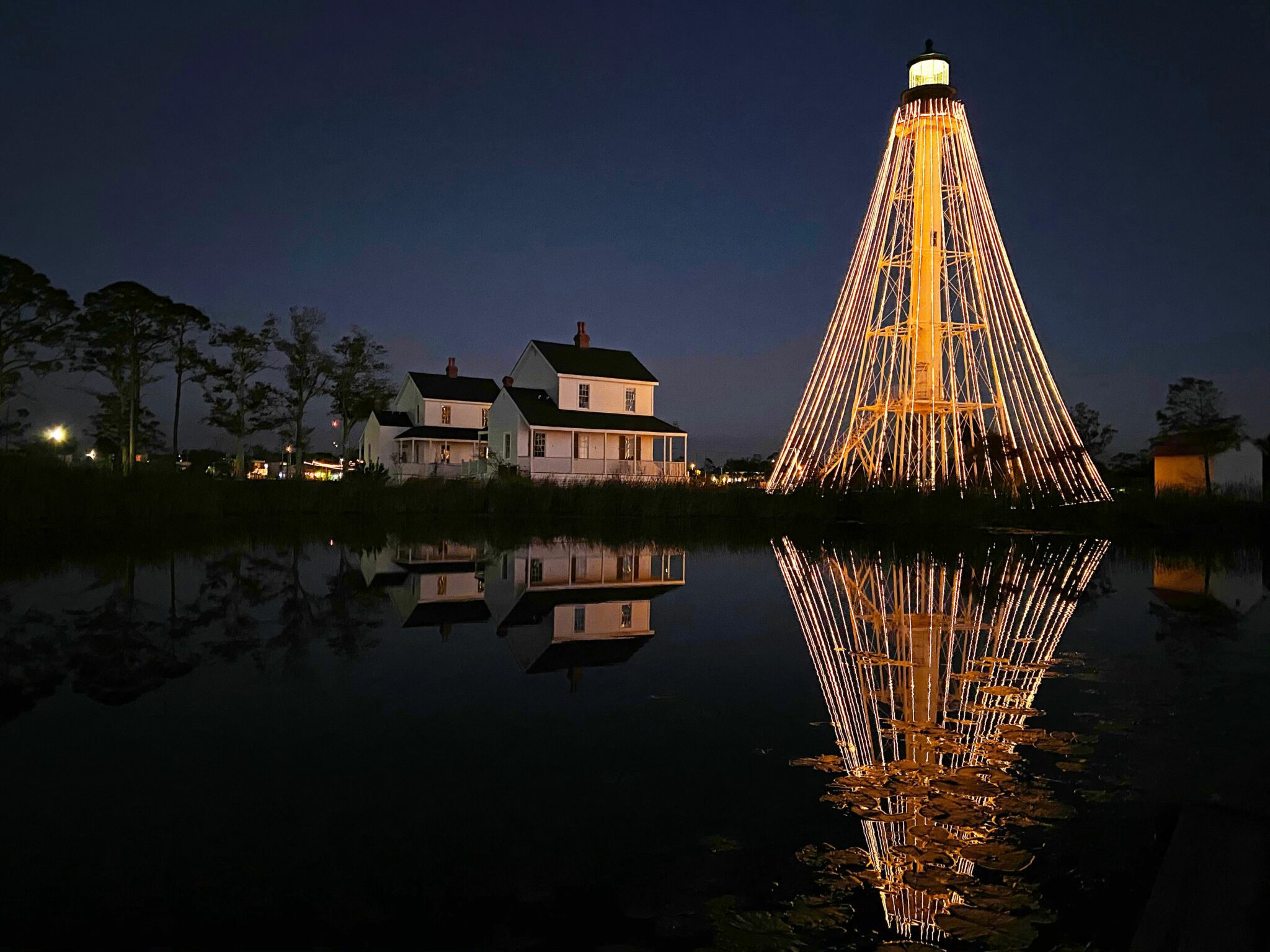 Port St. Joe light house with Christmas lights, at night.